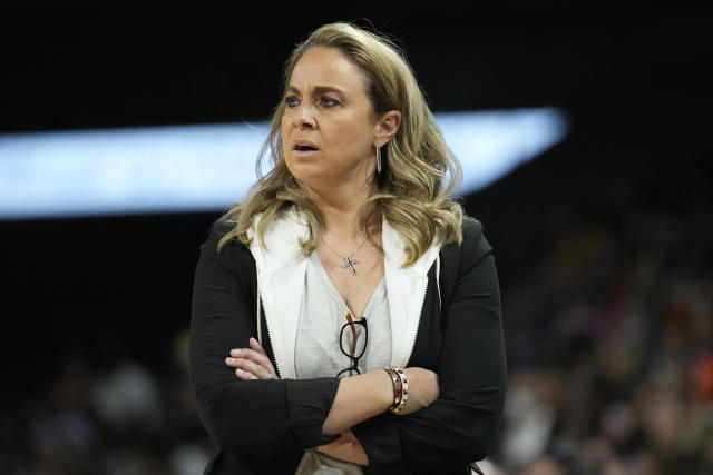 FILE - Las Vegas Aces head coach Becky Hammon looks on during a WNBA game against the Dallas Wings Sunday, June 5, 2022, in Las Vegas. The WNBA suspended Las Vegas Aces coach Becky Hammon for two games without pay Tuesday, May 16, 2023, for violating league and team respect in the workplace policies. The violation was related to comments made by Hammon to Dearica Hamby in connection with the player's recent pregnancy. (AP Photo/John Loche, Filer)