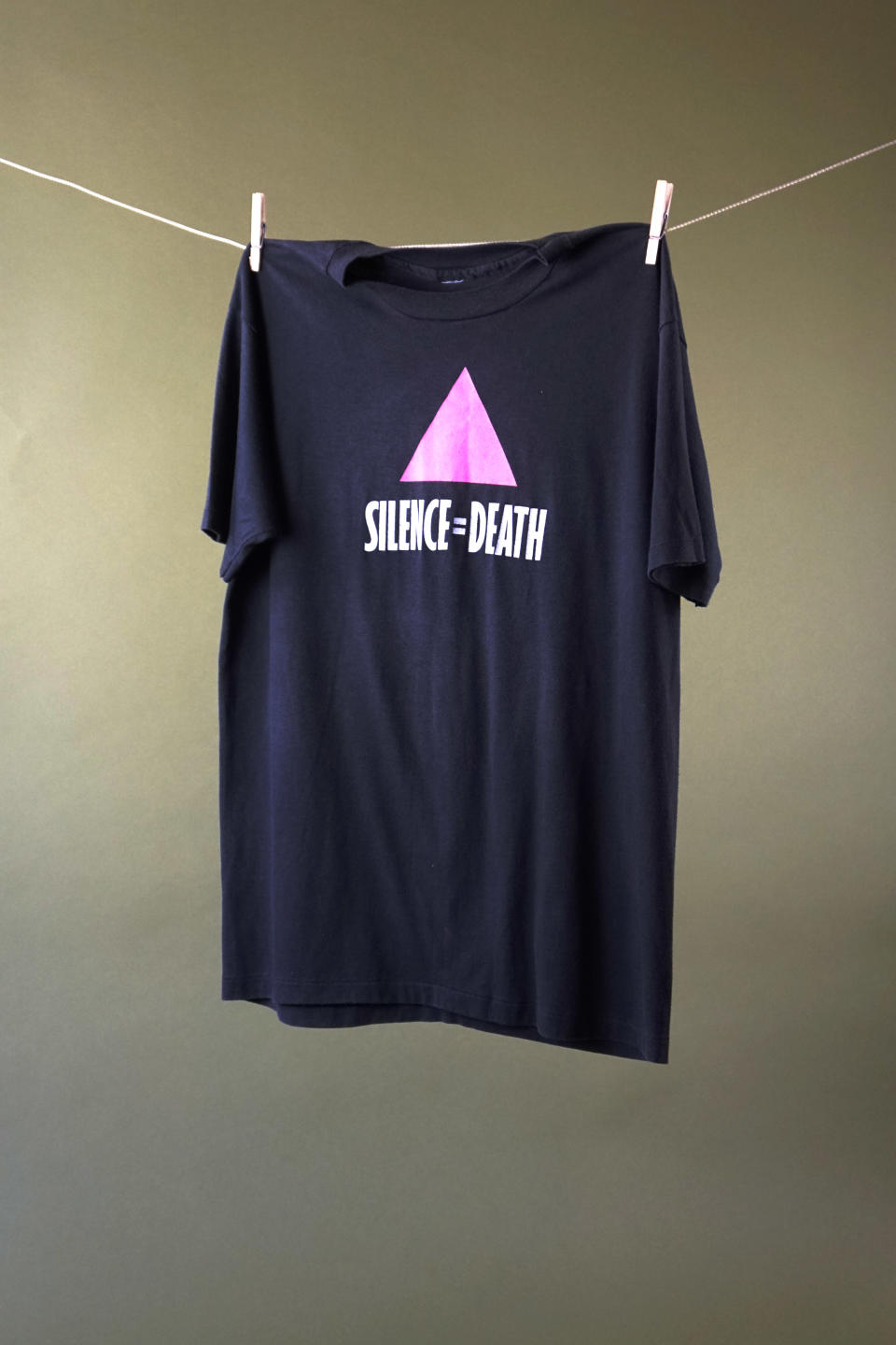 A "Silence = Death" campaign t-shirt on display.