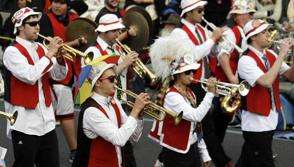 The Stanford University band, known for their colorful nonconformity, march in the 124th Rose Parade in Pasadena, Calif., Tuesday, Jan. 1, 2013. Stanford will play Wisconsin in the Rose Bowl football game. (AP Photo/Reed Saxon)