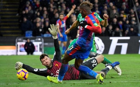 Wilfried Zaha shoots from a tight angle - Credit: reuters