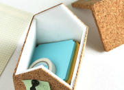 <body> <p>Put a cork in office clutter with these cork storage boxes fashioned after your own humble home. The handy houses, assembled with hot glue from foam core, and wrapped with <a rel="nofollow noopener" href=" http://www.bobvila.com/slideshow/6-things-you-didn-t-know-adhesive-can-do-50061?bv=yahoo" target="_blank" data-ylk="slk:adhesive;elm:context_link;itc:0;sec:content-canvas" class="link ">adhesive</a> cork, offer adorable storage for office supplies. Or, use the exterior as a pin board for notes and memos.</p> <p><strong>Related: <a rel="nofollow noopener" href=" http://www.bobvila.com/slideshow/organize-your-life-with-12-dollar-store-buys-48589?bv=yahoo" target="_blank" data-ylk="slk:Organize Your Life with 12 Dollar-Store Buys;elm:context_link;itc:0;sec:content-canvas" class="link ">Organize Your Life with 12 Dollar-Store Buys</a> </strong> </p> </body>