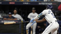 Tampa Bay Rays' Randy Arozarena loses his grip on the bat as he swings at a Boston Red Sox pitch during the second inning of Game 2 of a baseball American League Division Series, Friday, Oct. 8, 2021, in St. Petersburg, Fla. Arozarena struck out on the at-bat. (AP Photo/Steve Helber)