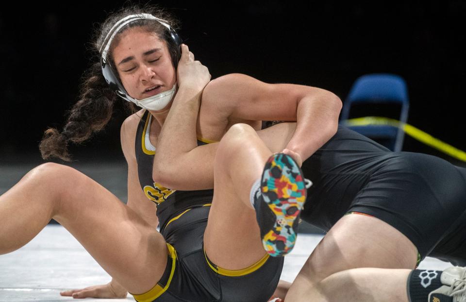 Tokays Kayleen Tuavao, left, grapples with Marysville's Emma Mallen in the girls 145-lb weight class of the Sac-Joaquin Section Masters Boys Wrestling Tournament at the Adventist Health arena in downtown Stockton on Feb. 16, 2024.