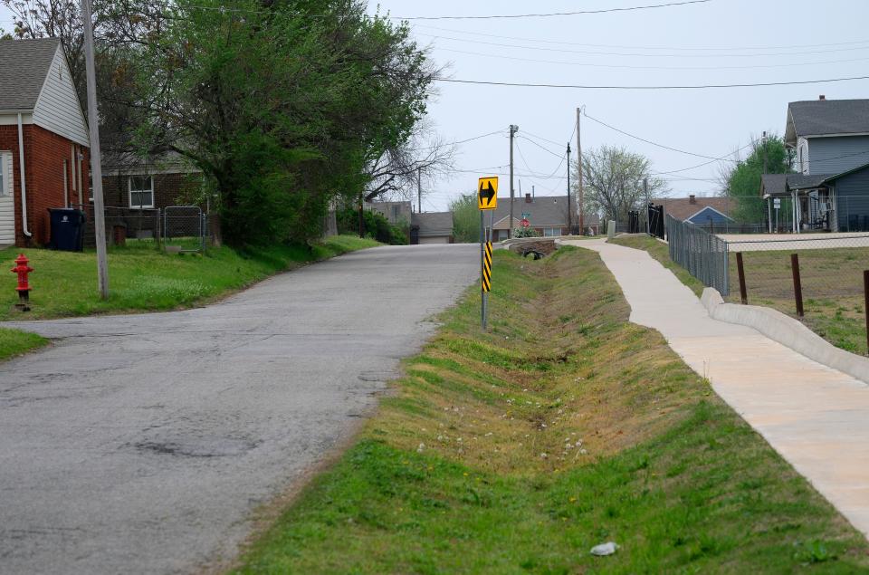 N Highland Drive, which runs north from the Relax Inn, is pictured April 1. Neighbors say the motel and other trouble spots along NE 23 create lots of undesirable foot traffic into a residential neighborhood.