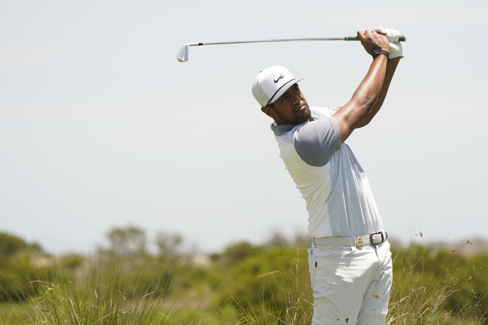 Tony Finau hits on the fifth tee during the third round at the PGA Championship golf tournament on the Ocean Course, Saturday, May 22, 2021, in Kiawah Island, S.C. (AP Photo/Matt York)