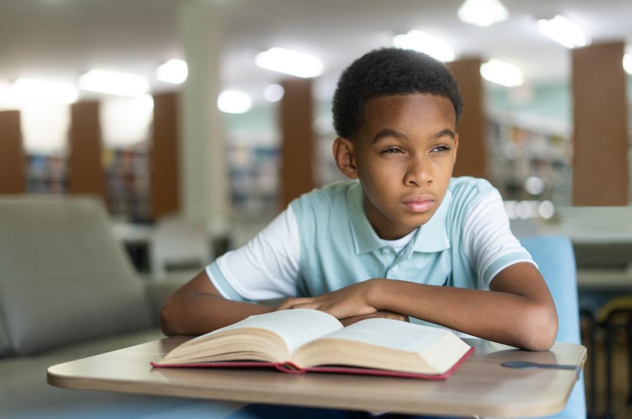 Teachers had more negative comments about Black boys than they did about other groups. <a href="https://www.gettyimages.com/detail/photo/boy-sitting-in-class-and-trying-to-read-board-royalty-free-image/1413457551?phrase=students+in+trouble+black&adppopup=true" rel="nofollow noopener" target="_blank" data-ylk="slk:aldomurillo/E+ via Getty Images;elm:context_link;itc:0;sec:content-canvas" class="link ">aldomurillo/E+ via Getty Images</a>