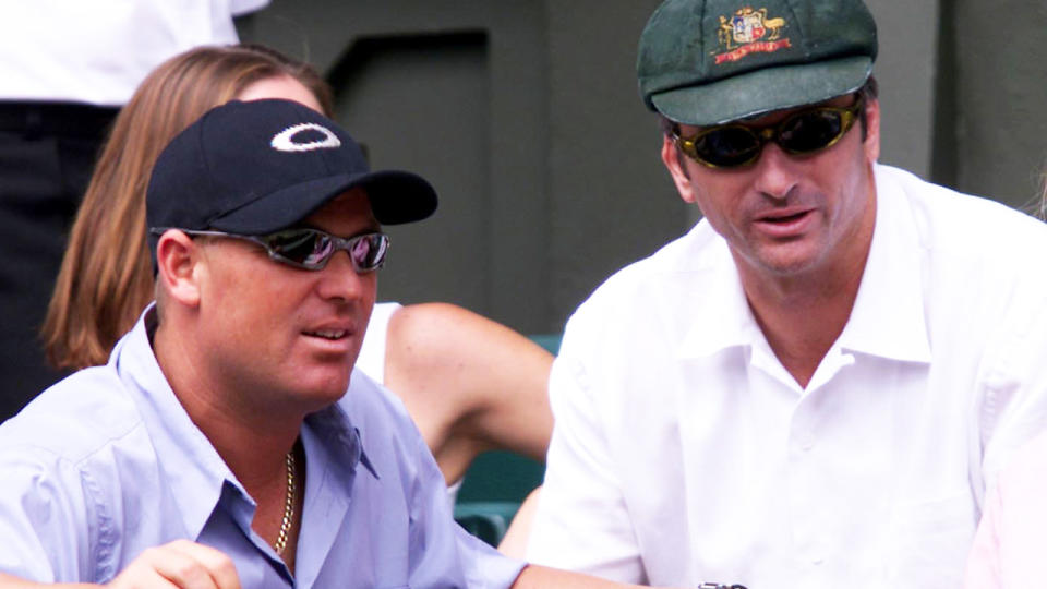 Shane Warne, pictured here refusing to wear the Baggy Green with Steve Waugh at the 2001 Wimbledon final. 