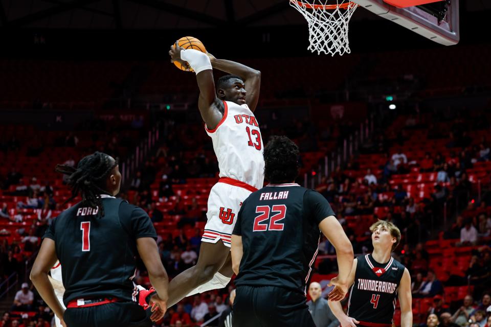 Utah center Keba Keita (13) dunks the ball during the Runnin’ Utes’ 88-86 win over Southern Utah at the Huntsman Center in Salt Lake City, Utah, on Tuesday, Dec. 5, 2023.