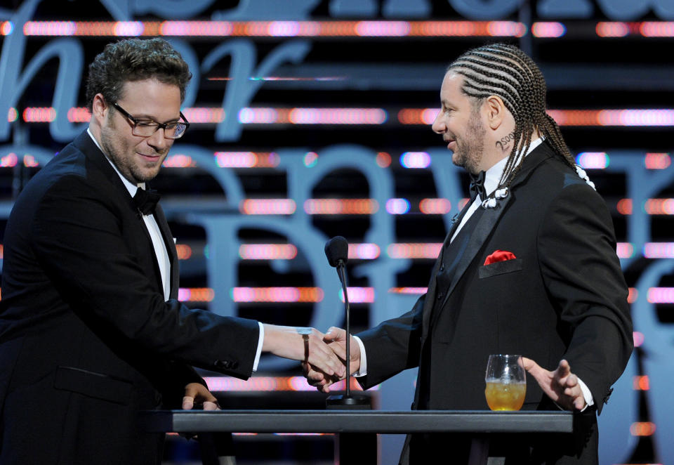 CULVER CITY, CA - AUGUST 25: (L-R) Roast Master Seth Rogen and comedian Jeffrey Ross speak onstage during The Comedy Central Roast of James Franco at Culver Studios on August 25, 2013 in Culver City, California. The Comedy Central Roast Of James Franco will air on September 2 at 10:00 p.m. ET/PT.  (Photo by Kevin Winter/Getty Images for Comedy Central)