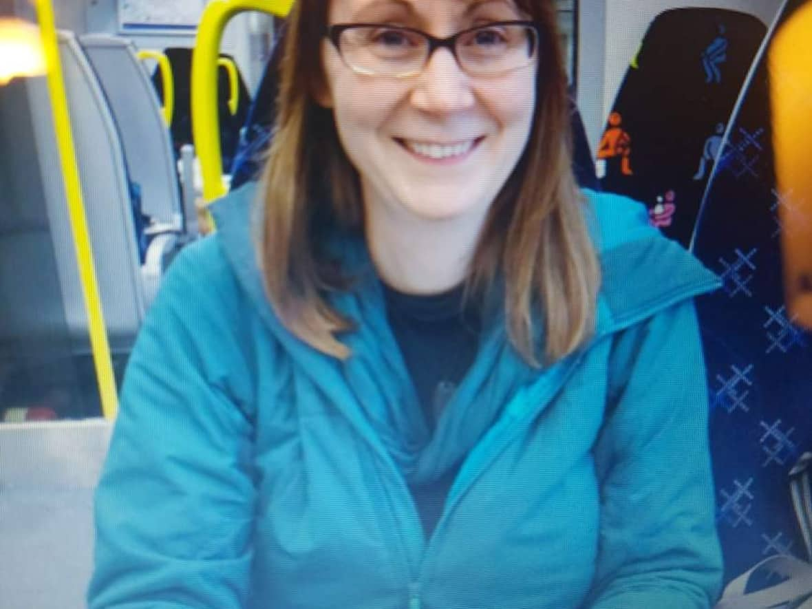 Whitehorse RCMP are looking for help finding Deanna Bailey. She's described as a slim-build Caucasian woman, aged 45, and about five feet, four inches tall. She has long brown/red hair and green eyes and could be wearing glasses. (Whitehorse RCMP - image credit)