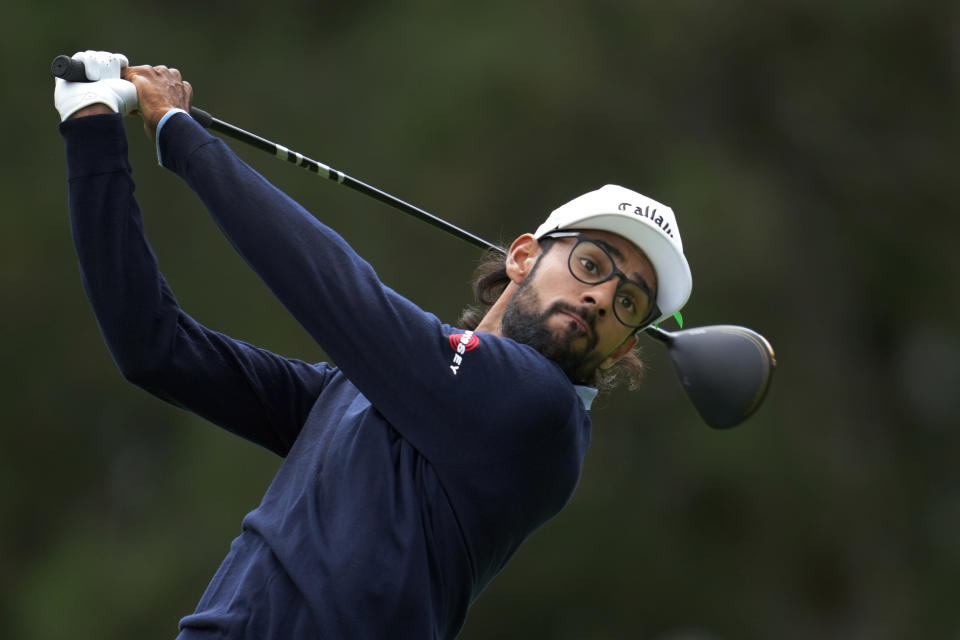 Akshay Bhatia hits from the fourth tee during the final round of the Rocket Mortgage Classic golf tournament at Detroit Country Club, Sunday, June 30, 2024, in Detroit. (AP Photo/Paul Sancya)