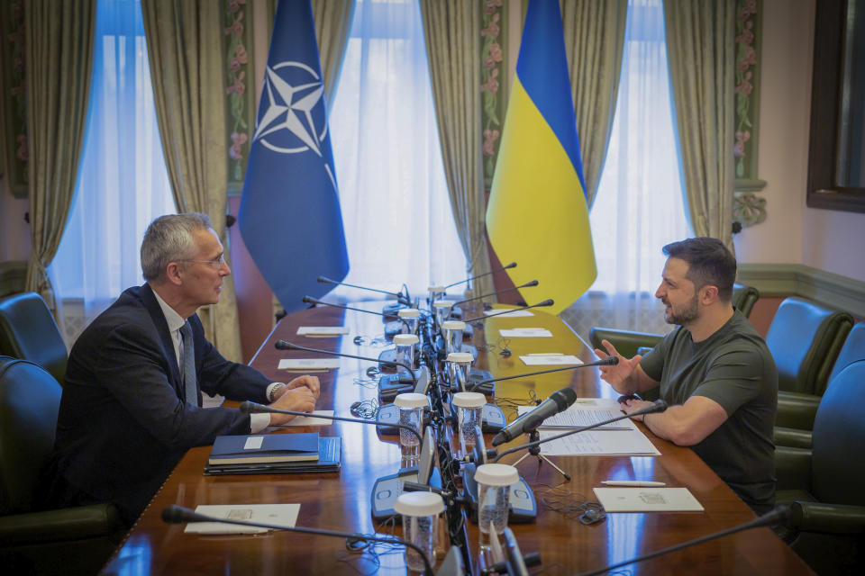 NATO Secretary General Jens Stoltenberg, left, and Ukrainian President Volodymyr Zelenskyy talk during their meeting in Kyiv, Ukraine, Thursday, Sept. 28, 2023. (Ukrainian Presidential Press Office via AP)