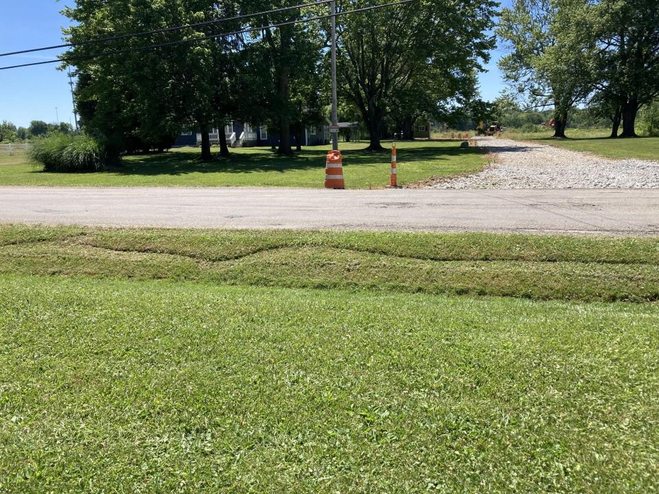 An access road to one of two JPL Development properties the company wants to develop in Norton.  The road in this June 22, 2022, photo, is located across Clubside Drive from the home of Tammy Taylor, a resident who opposes rezoning for the land.