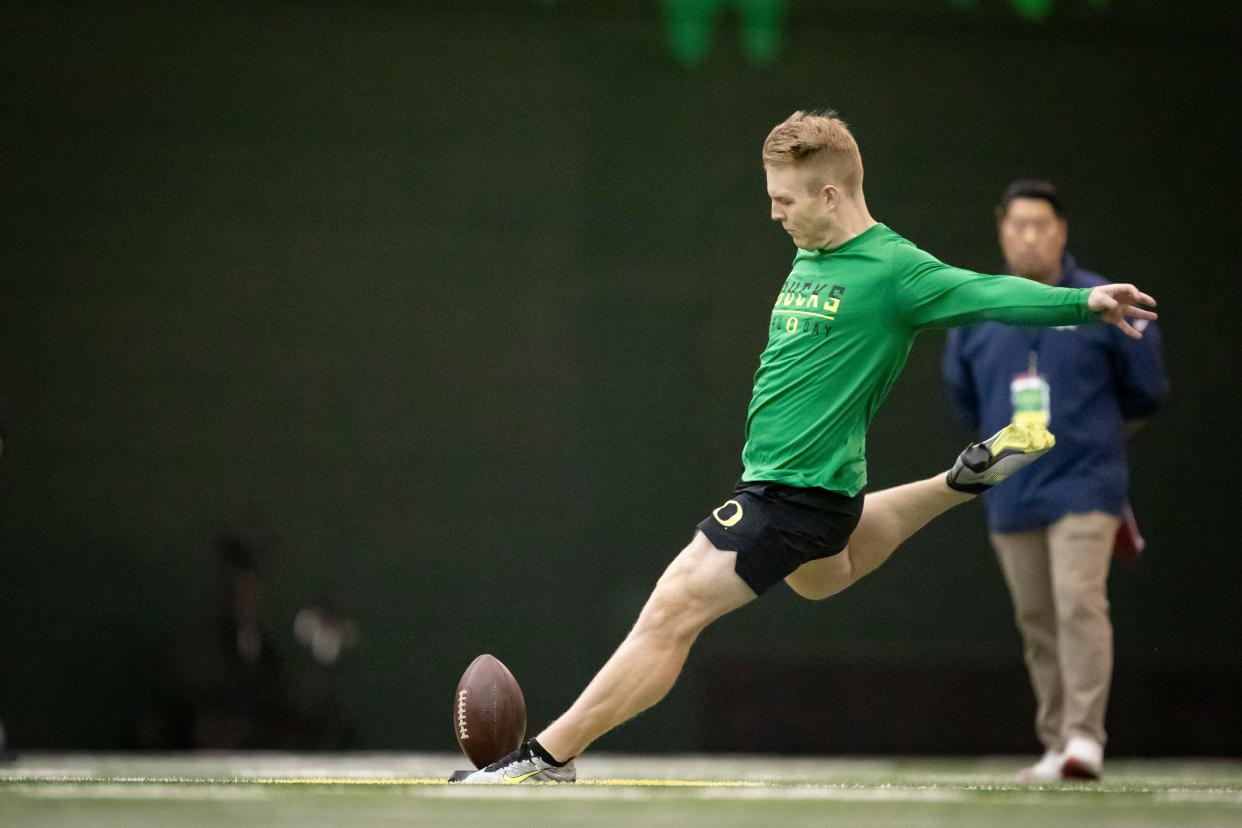 Oregon kicker Camden Lewis takes a kick during Oregon Pro Day Tuesday, March 12, 2024 at the Moshofsky Center in Eugene, Ore.