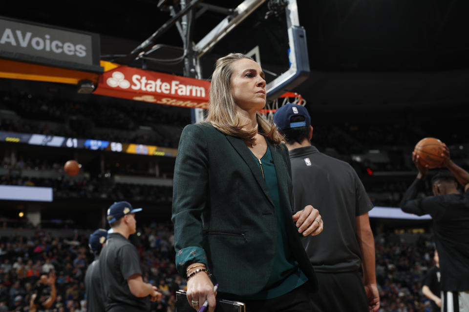 San Antonio Spurs assistant coach Becky Hammon in the second half of an NBA basketball game Tuesday, Feb. 13, 2018, in Denver. The Nuggets won 117-109. (AP Photo/David Zalubowski)