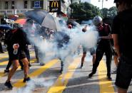 Anti-government demonstrators attend a protest march in Hong Kong