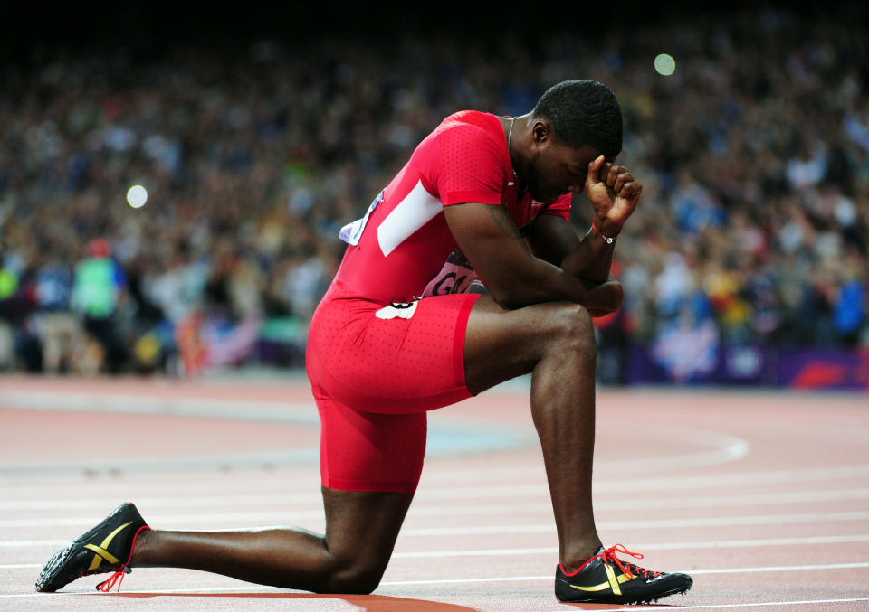 <a href="http://sports.yahoo.com/olympics/track-field/justin-gatlin-1132934/" data-ylk="slk:Justin Gatlin;elm:context_link;itc:0;sec:content-canvas" class="link ">Justin Gatlin</a> of the United States looks on after earning the bronze medal the Men's 100m Final behind Jamaica's Usain Bolt and Yohan Blake, respectively, on Sunday August 5, 2012 at Olympic Stadium in London. (Photo by Stu Forster/Getty Images)