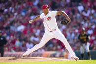 Cincinnati Reds starting pitcher Hunter Greene throws against the Pittsburgh Pirates in the first inning of an opening day baseball game in Cincinnati, Thursday, March 30, 2023. (AP Photo/Jeff Dean)