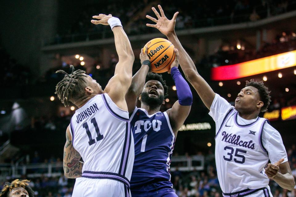 Kansas State's Keyontae Johnson (11) and Nae'Qwan Tomlin (35) challenge a shot by TCU guard Mike Miles last Thursday during the Big 12 Tournament in Kansas City. K-State faces Montana State at 8:40 p.m. CT Friday in the NCAA Tournament.