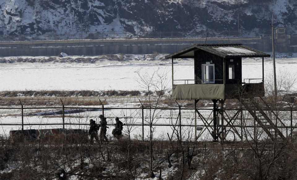 North Korea's military warns that troops have aimed artillery at seven South Korean media groups to express outrage over criticism in Seoul of ongoing children's festivals in Pyongyang. It threatens a "merciless sacred war."<br><br>  <em>Caption: South Korean army soldiers patrol along the barbed-wire fence near the border village of Panmunjom, which has separated the two Koreas since the Korean War, in Paju, north of Seoul, South Korea, Saturday, Feb. 16, 2013. (AP Photo/Lee Jin-man)</em>