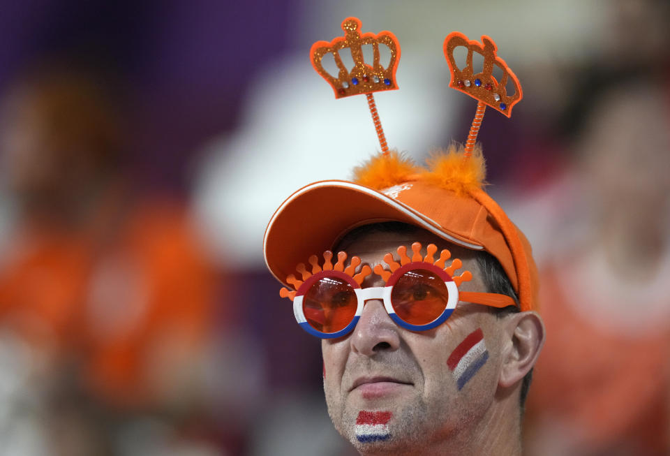 A fan of the Netherlands at the stand prior the World Cup group A soccer match between Netherlands and Ecuador, at the Khalifa International Stadium in Doha, Qatar, Friday, Nov. 25, 2022. (AP Photo/Themba Hadebe)