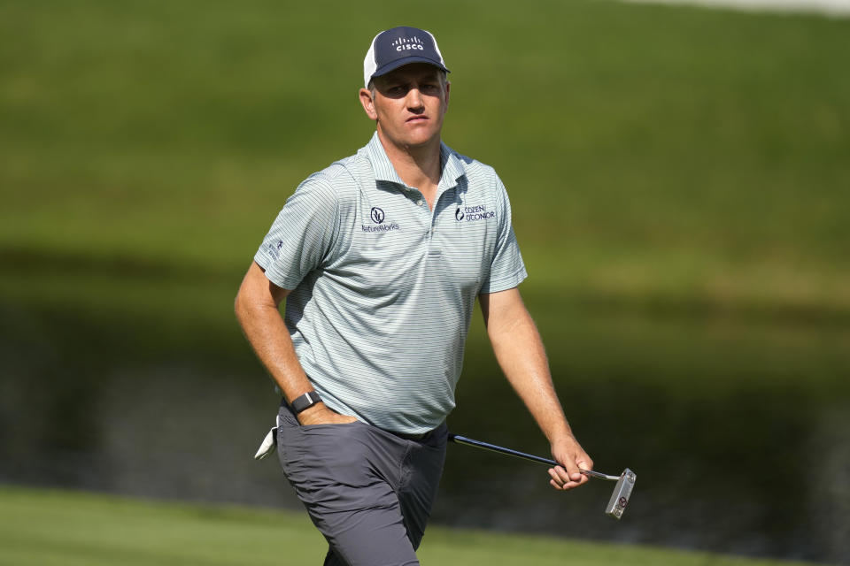 Brendon Todd walks to the 18th green during the third round of the John Deere Classic golf tournament, Saturday, July 8, 2023, at TPC Deere Run in Silvis, Ill. (AP Photo/Charlie Neibergall)