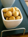 <div class="caption-credit"> Photo by: istock.com</div><b>Macadamia Nuts: The Most MUFAs</b> <br> Although ounce for ounce they're one of the most calorie-dense nuts, macadamia nuts contain the greatest amount of heart-healthy monounsaturated fat (MUFA) per serving. "This 'good fat' lowers LDL 'bad' cholesterol levels and blood pressure," says Bauer. A Pennsylvania State University study (funded partly by the Hershey Company, which owns the Mauna Loa Macademia company) found that people who added macadamia nuts to their diets reduced their triglyceride levels, total cholesterol, and LDL cholesterol by nearly 10 percent. <br> Serving info: About 10 nuts = 200 cals, 22 grams fat