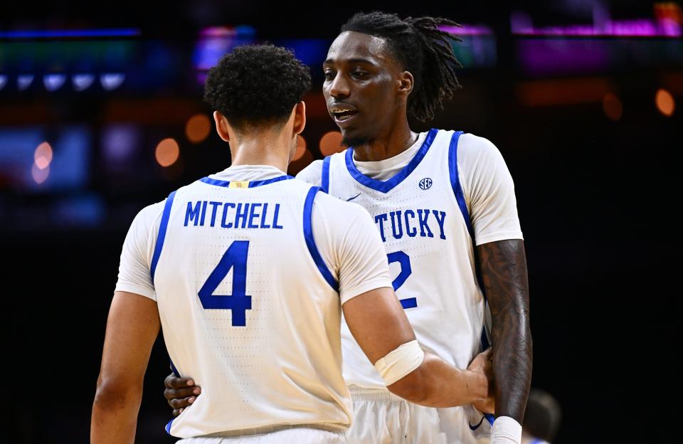 Dec 9, 2023; Philadelphia, Pennsylvania, USA; Kentucky Wildcats forward Aaron Bradshaw (2) talks with forward Tre Mitchell (4) in the first half against the Penn Quakers at Wells Fargo Center.