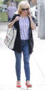 <p>The Academy Award-winning actress stepped out in Los Angeles looking rather patriotic in a blue and white striped shirt and bright reddish pumps which she paired with a "Love Y'all" tote from her Draper James line ($165; <a rel="nofollow noopener" href="http://www.pntra.com/t/8-10718-131940-134982?sid=ISReeseWSSToteIJMarch&url=https%3A%2F%2Fwww.draperjames.com%2Flove-y-all-vanderbilt-tote" target="_blank" data-ylk="slk:draperjames.com;elm:context_link;itc:0;sec:content-canvas" class="link ">draperjames.com</a>). </p>