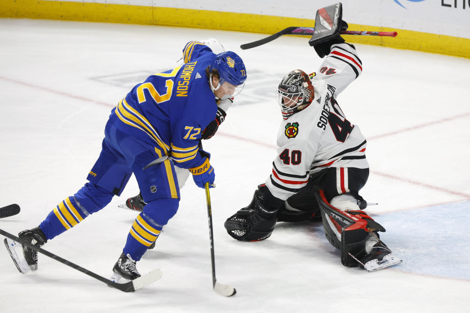 Buffalo Sabres right wing Tage Thompson (72) controls the puck in front of Chicago Blackhawks goaltender Arvid Soderblom (40) during the third period of an NHL hockey game, Saturday, Oct. 29, 2022, in Buffalo, N.Y. (AP Photo/Jeffrey T. Barnes)