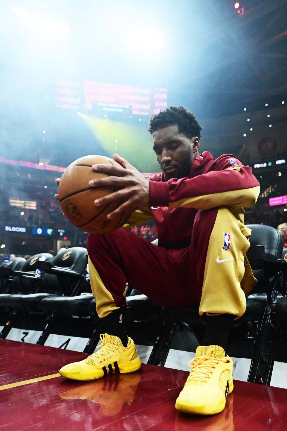 Cleveland Cavaliers guard Donovan Mitchell (45) sits court side before a game against the Memphis Grizzlies on Wednesday in Cleveland.