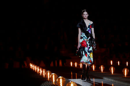 A model presents a creation by Prada during the Milan Fashion Week in Milan, Italy February 21, 2019. REUTERS/Alessandro Garofalo