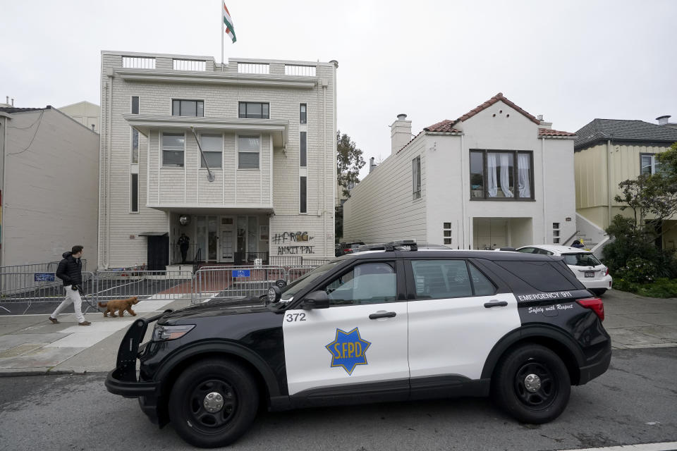 A San Francisco Police vehicle parks outside of the Consulate General of India in San Francisco, Monday, March 20, 2023. San Francisco police had erected barriers and parked a vehicle nearby as people protested outside the Consulate General of India to protest the capture of Amritpal Singh. (AP Photo/Jeff Chiu)