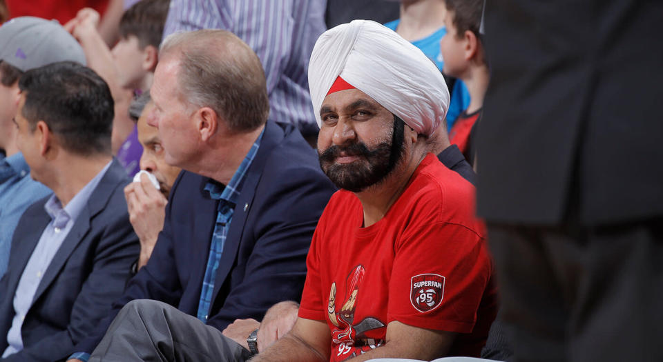 Toronto Raptors superfan Nav Bhatia responds to racist Bucks fans. (Rocky Widner/NBAE via Getty Images) 