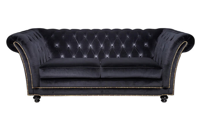 <b>Lust, two-seater sofa</b><br><br>Designed by the unashamedly flamboyant Laurence Llewelyn-Bowen, this luxurious black velvet sofa screams opulence. Whether you go all-out Baroque, or prefer to have just one plush piece, this sofa is sure to make you feel decadently glamorous (even in your PJs). <br><br> <b>£749, <a href="http://www.very.co.uk/laurence-llewelyn-bowen-lust-2-seater-fabric-sofa/1124978288.prd?crossSellType=pzone1&parentProductId=prod11760976" rel="nofollow noopener" target="_blank" data-ylk="slk:Very;elm:context_link;itc:0;sec:content-canvas" class="link ">Very</a></b>