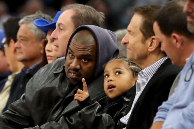 Kanye West takes his son Saint to a Golden State Warriors game against the Boston Celtics in March in San Francisco. (Photo: Ray Chavez/MediaNews Group/The Mercury News via Getty Images)