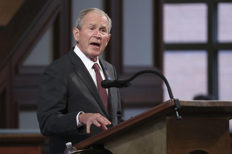 <p>Former President George W. Bush was one of three former presidents to speak at the funeral (the others being Clinton and Obama). "He’s been called an American saint, a believer willing to give up everything, even life itself, to bear witness to the truth that drove him all his life: that we could build a world of peace and justice, harmony and dignity and love," Bush said in his eulogy. </p>