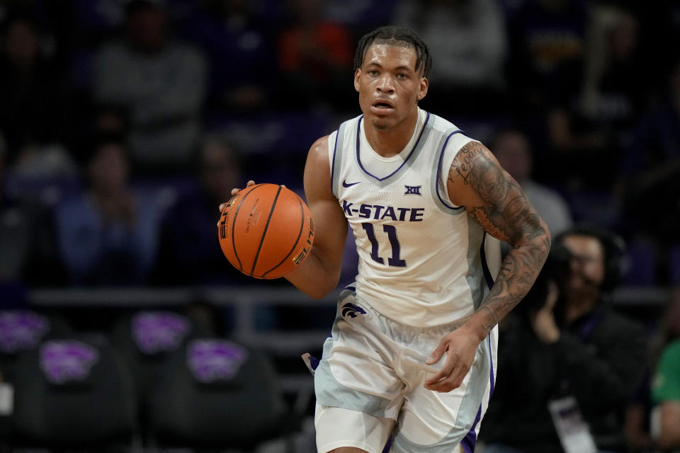 Kansas State forward Keyontae Johnson drives during the first half of an NCAA college basketball game against Texas-Rio Grande Valley Monday, Nov. 7, 2022, in Manhattan, Kan. On Dec. 12, 2020, Johnson collapsed on the court while playing for Florida in a game against rival Florida State. (AP Photo/Charlie Riedel)