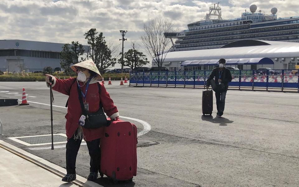 Passengers leave Diamond Princess after quarantine - Getty