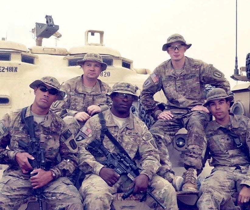 Richard Brookshire, far right, is shown during his deployment to Afghanistan in 2011, where as a combat medic he trained other medics.