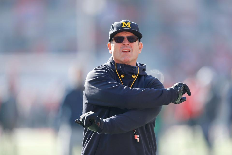 Michigan head coach Jim Harbaugh secured $500,000 for the Wolverines winning the Big Ten Conference East Division and a berth in the Big Ten title game.