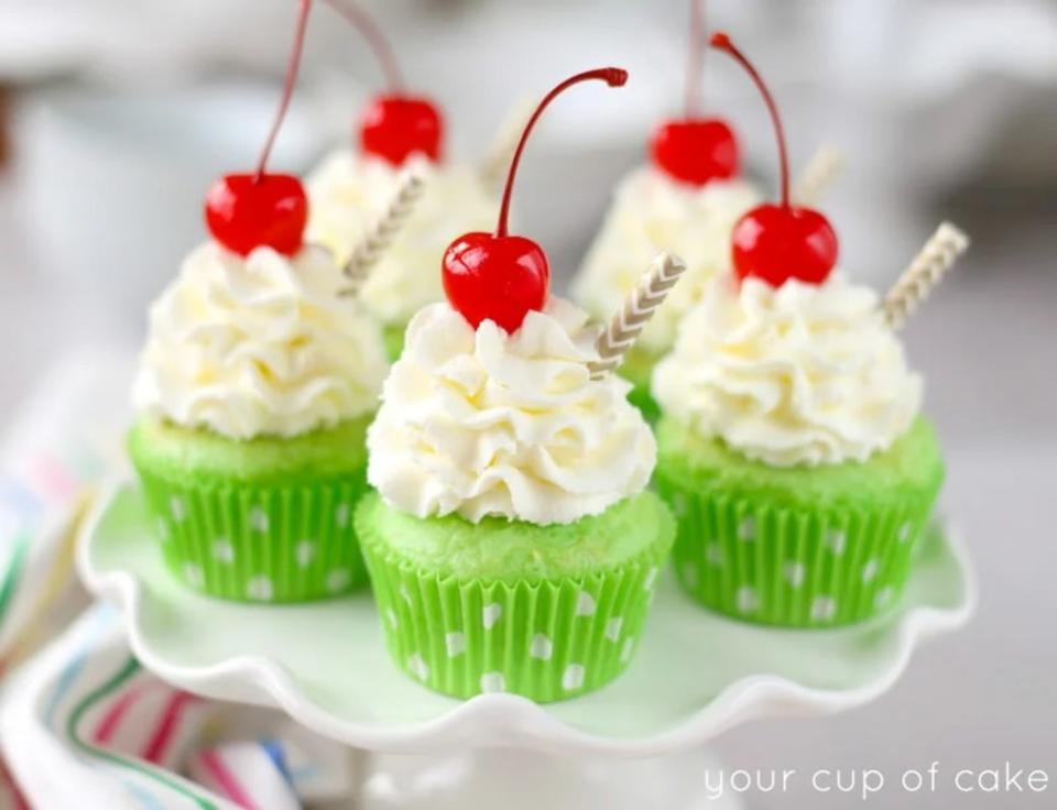 <p>Your Cup of Cake</p><p>These treats are the perfect St. Patrick’s Day Cupcakes and with a cherry on top, no one will be able to resist!</p><p><strong>Get the recipe here: <a href="https://www.yourcupofcake.com/shamrock-shake-cupcakes/" rel="nofollow noopener" target="_blank" data-ylk="slk:Shamrock Shake Cupcakes;elm:context_link;itc:0;sec:content-canvas" class="link ">Shamrock Shake Cupcakes</a></strong></p>