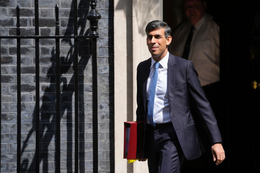 Britain's Prime Minister Rishi Sunak leaves 10 Downing Street to go to the House of Commons for his weekly Prime Minister's Questions in London, Wednesday, May 1, 2024. (AP Photo/Kin Cheung)