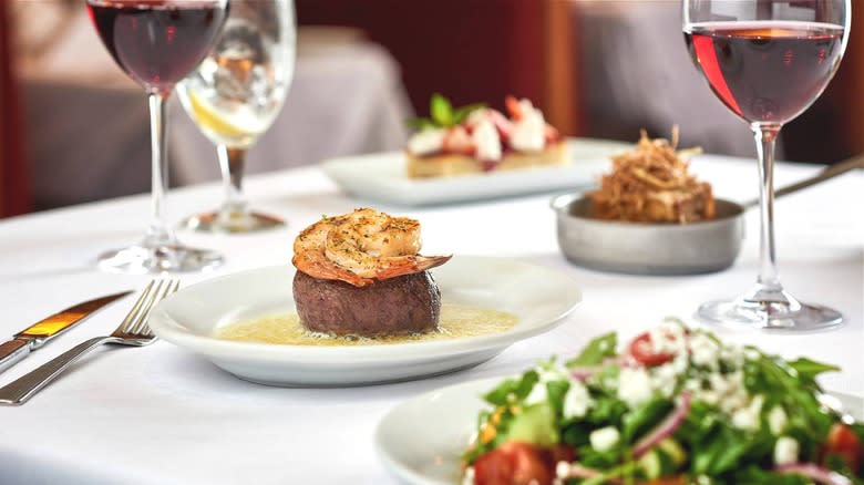 Steak with wine in glasses