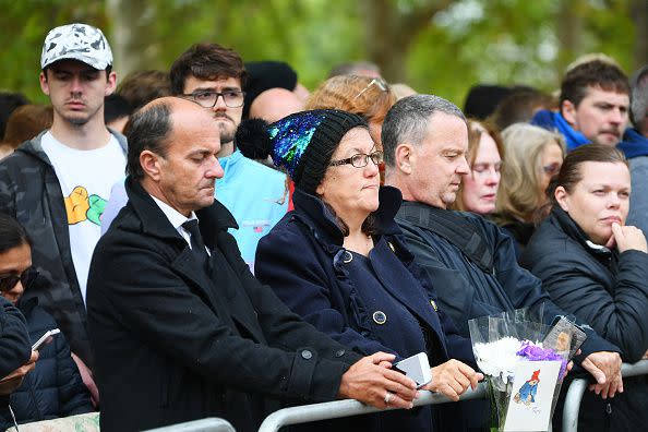 LONDON, ENGLAND - SEPTEMBER 19: Mourners at Westminster Abbey for the State Funeral of Queen Elizabeth II on September 19, 2022 in London, England. Elizabeth Alexandra Mary Windsor was born in Bruton Street, Mayfair, London on 21 April 1926. She married Prince Philip in 1947 and ascended the throne of the United Kingdom and Commonwealth on 6 February 1952 after the death of her Father, King George VI. Queen Elizabeth II died at Balmoral Castle in Scotland on September 8, 2022, and is succeeded by her eldest son, King Charles III.  (Photo by Joe Maher/Getty Images)