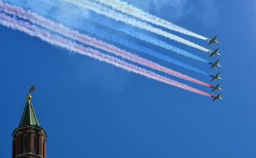 Russian Su-25 aircraft trail the colours of the national flag over Red Square to mark the anniversary of victory over Nazi Germany in 1945