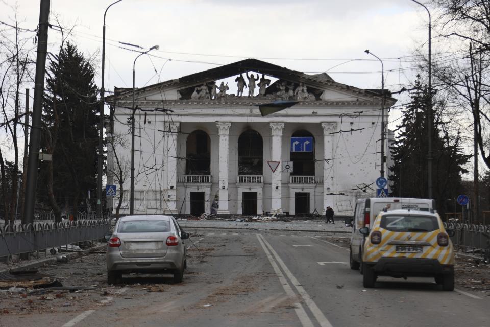 FILE - A view of the Mariupol theater damaged during fighting in Mariupol, in territory under the government of the Donetsk People's Republic, eastern Ukraine, Monday, April 4, 2022. Ministers from dozens of nations are meeting on Thursday, July 14, 2022 in the Netherlands to discuss with the International Criminal Court’s chief prosecutor how best to coordinate efforts to bring to justice perpetrators of war crimes in Ukraine. (AP Photo/Alexei Alexandrov, File)