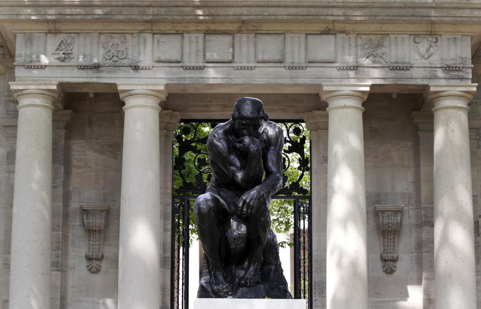 Auguste Rodin's "The Thinker" is displayed at the entrance to the grounds of the Rodin Museum on Wednesday, May 16, 2012, in Philadelphia. After a three-year renovation, the museum is scheduled to reopen to the public on July 13. (AP Photo/Alex Brandon)