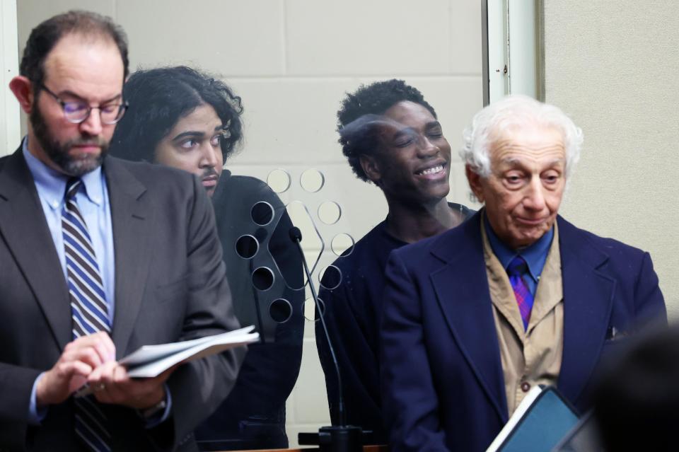 From left, Attorney Eduardo Masferrer, his client Nathan Veiga, defendant Jamal Augereau Bazile and his attorney Louis Badwey are in Brockton District Court on Tuesday, Jan. 16, 2024, for Veiga and Bazile's arraignments in connection with a fatal shooting at a city sushi restaurant on Friday evening, Jan. 12, 2024.