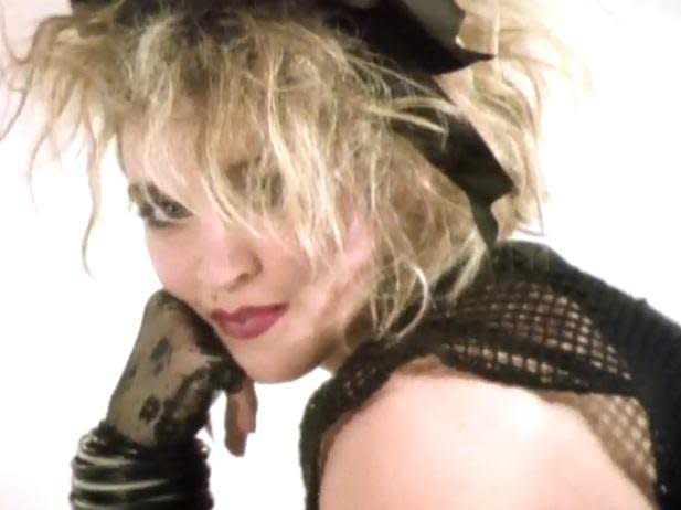 <strong>Billboard peak:</strong> No. 4 <br> <br> Madonna's most '80s-sounding hit, "Lucky Star" spawned the bulk of the copycat costumes still seen at Halloween parties far and wide. "Lucky Star" made Madonna a fashion icon. It was her first Top 5 Billboard hit, propelled by the seminal look first seen in the music video. Teen girls everywhere emulated her black mesh top and bangles, the rosary worn as jewelry and the unruly hair tied up in a ribbon. 